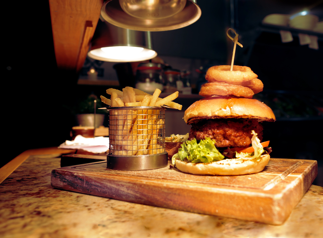 Image of a burger and fries at Loch and Quay